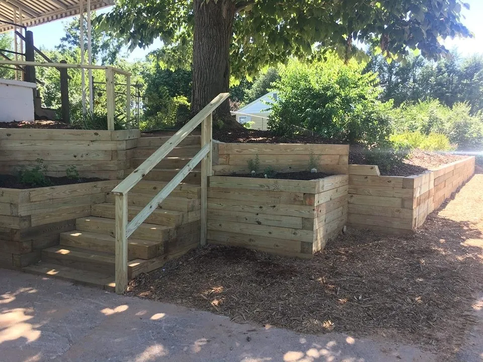 wood retaining wall terraced landscaping